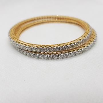 18kt solitaire bangle by 